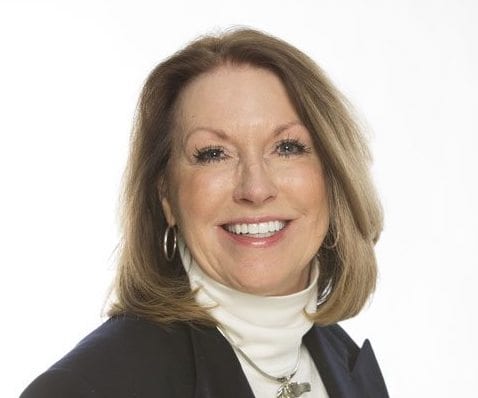 Dental patient after getting crowns in Lexington, KY